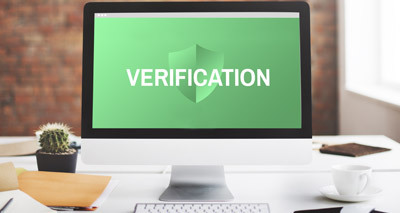 - An iMac displayeds a Verification screen, displaying that the Job In Sports subscription requires verification.